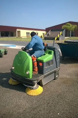 1404 Vacuum Industrial Sweeper by IPC Sold by Proline Watertown SD - dust pan in action